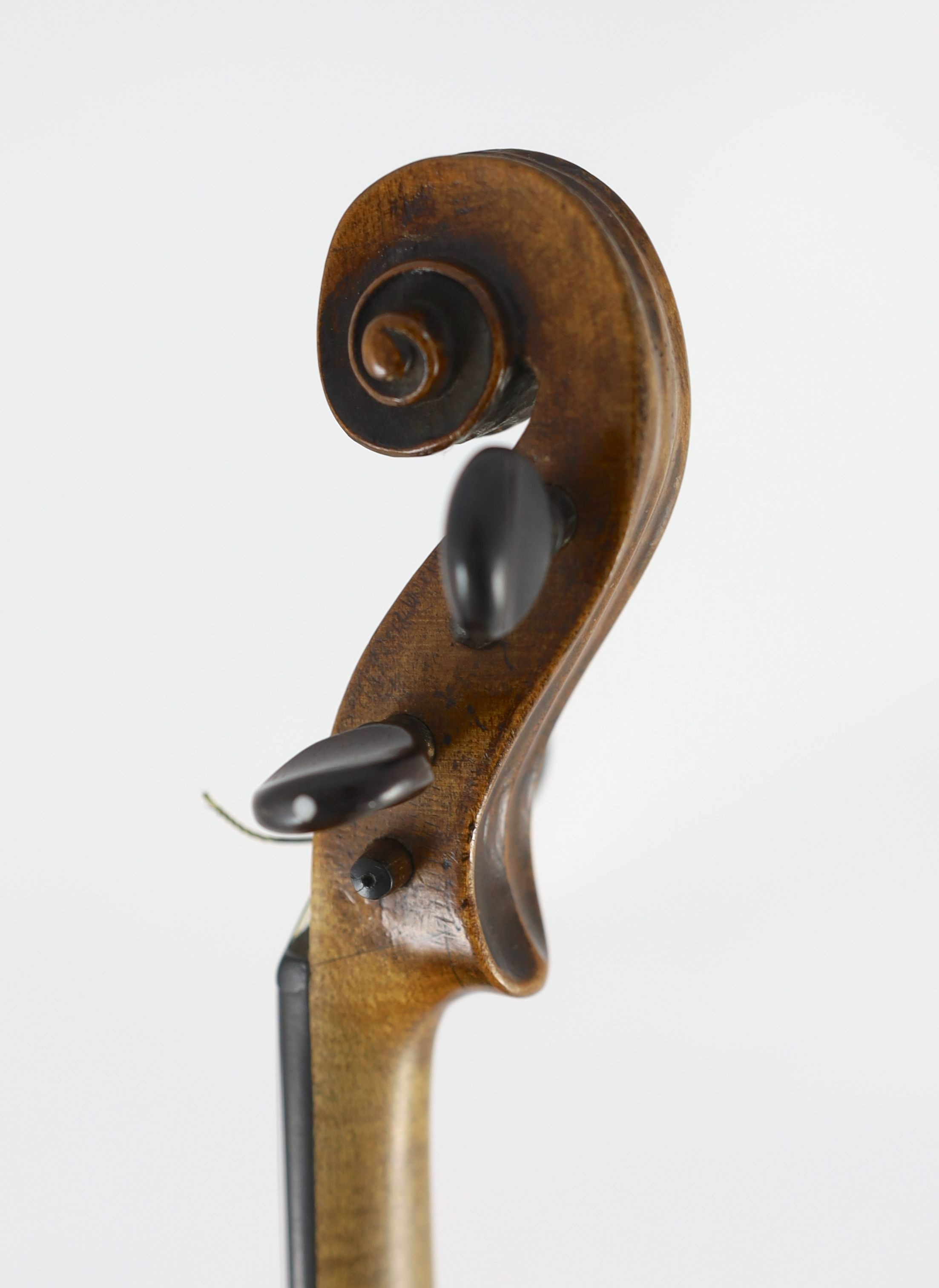 A 19th century violin, degraded internal paper label reads ‘Amati’, back measurement 36cm